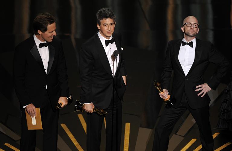Alexander Payne, Nat Faxon and Jim Rash accept the Oscar for best adapted screenplay for '“The Descendants'” during the 84th Academy Awards