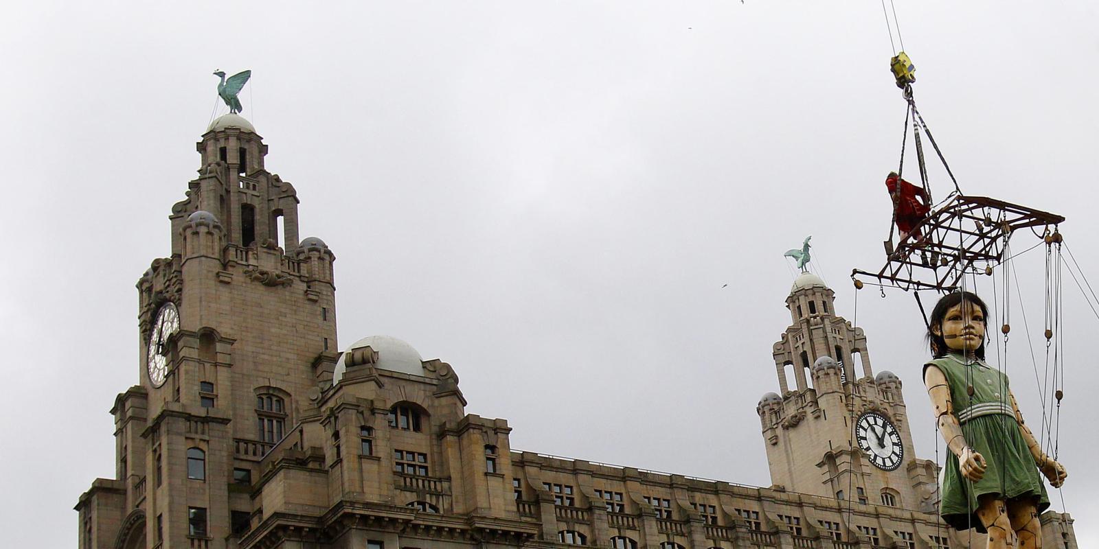 Giant puppets invade Liverpool pictures