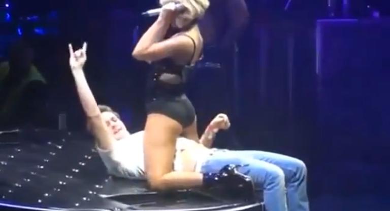 Girl gives guy a lap dance