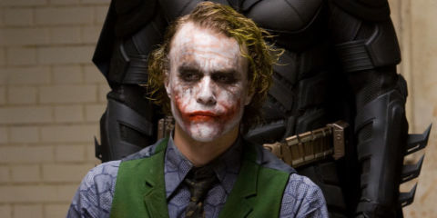 Christian Bale as Batman/Bruce Wayne and Heath Ledger as The Joker in The Dark Knight