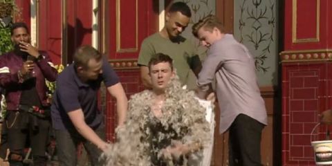 Lee covered in feathers