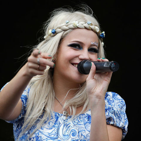 NEWPORT, ISLE OF WIGHT - JUNE 12: Pixie Lott performs live on the main stage during day three of the Isle of Wight Festival 2011 at Seaclose Park on June 12, 2011 in Newport, Isle of Wight.